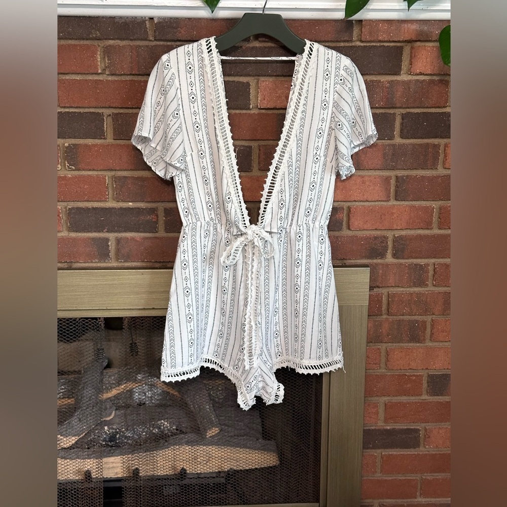#11) LUSH Lace trimmed open back and front romper with ties waist excellent.